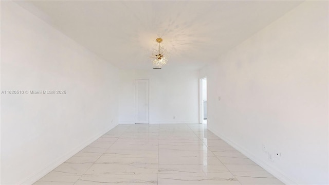 220 SW 8th Ave, Hallandale Beach, FL 33009 - unfurnished room featuring light marble finish floors