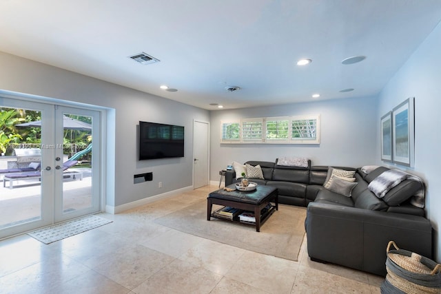 11900 SW 72nd Pl, Pinecrest, FL 33156 - living area with french doors, healthy amount of natural light, and recessed lighting