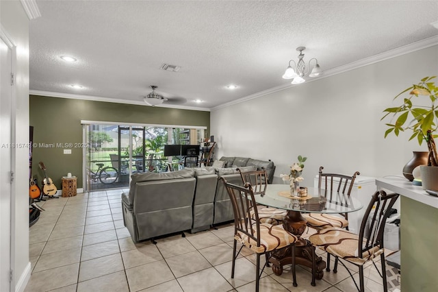 12006 SW 2nd St, Pembroke Pines, FL 33025 - dining room with light tile patterned floors, a textured ceiling, crown molding, a chandelier, and recessed lighting