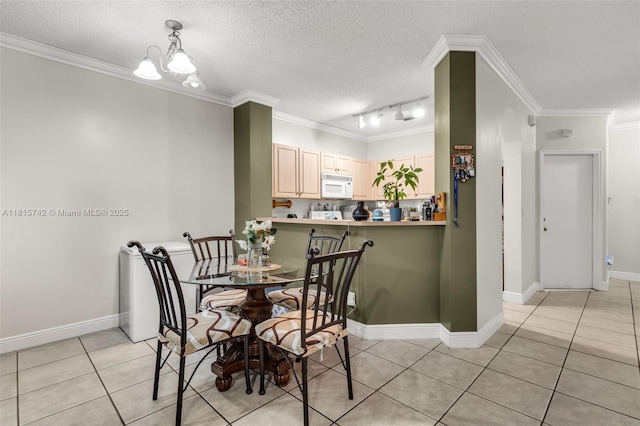 12006 SW 2nd St, Pembroke Pines, FL 33025 - dining space with light tile patterned floors, ornamental molding, a textured ceiling, track lighting, and a chandelier
