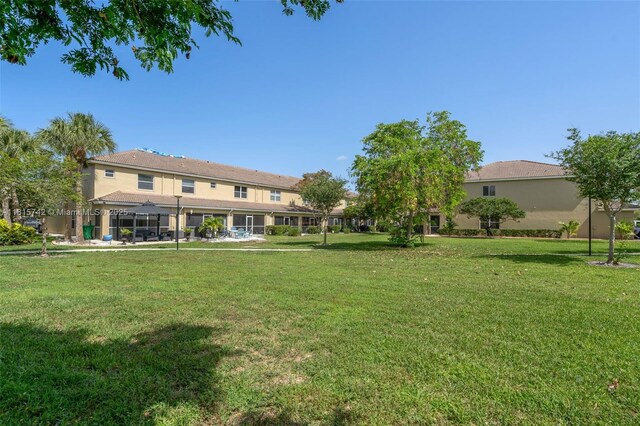 12006 SW 2nd St, Pembroke Pines, FL 33025 - view of green lawn