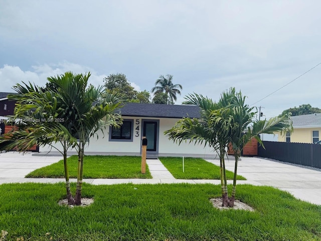 543 E 61st St, Hialeah, FL 33013 - single story home with concrete driveway and stucco siding