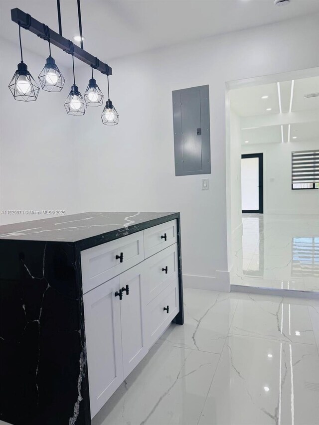 543 E 61st St, Hialeah, FL 33013 - bathroom featuring electric panel and marble finish flooring