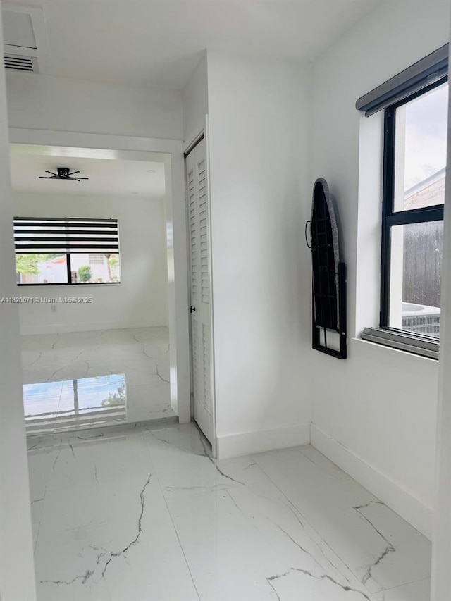 543 E 61st St, Hialeah, FL 33013 - spare room with marble finish flooring