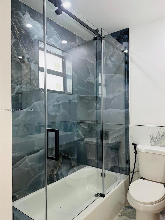 543 E 61st St, Hialeah, FL 33013 - bathroom with enclosed tub / shower combo and marble finish flooring
