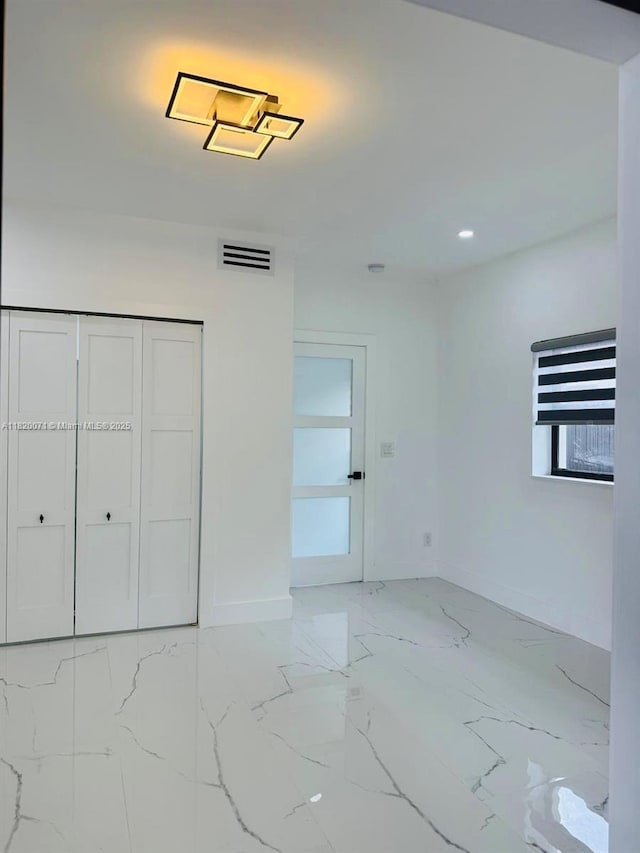 543 E 61st St, Hialeah, FL 33013 - garage with baseboards and recessed lighting