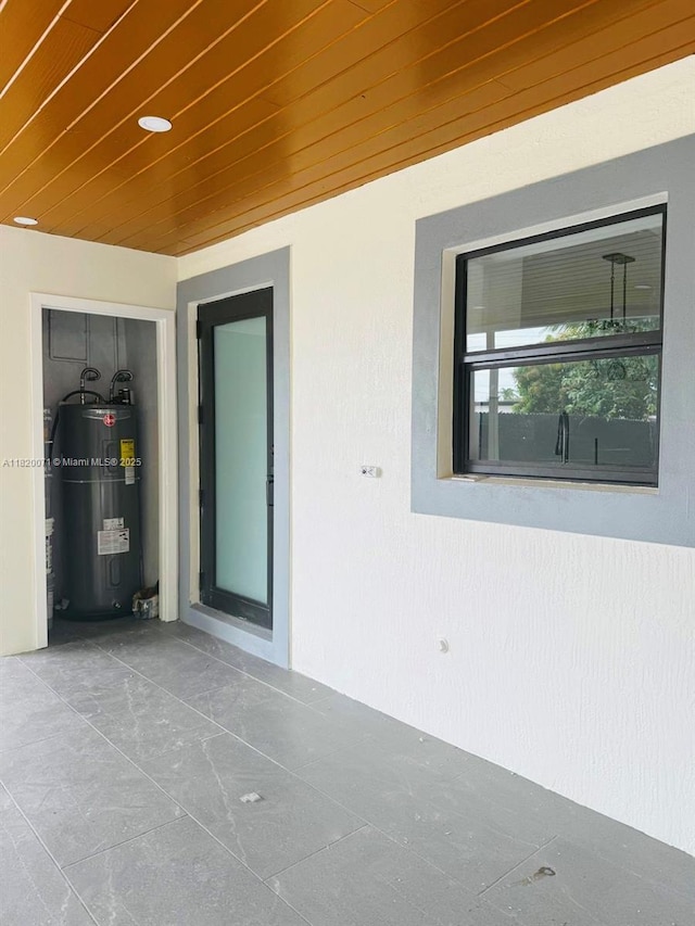 543 E 61st St, Hialeah, FL 33013 - view of patio / terrace with electric water heater