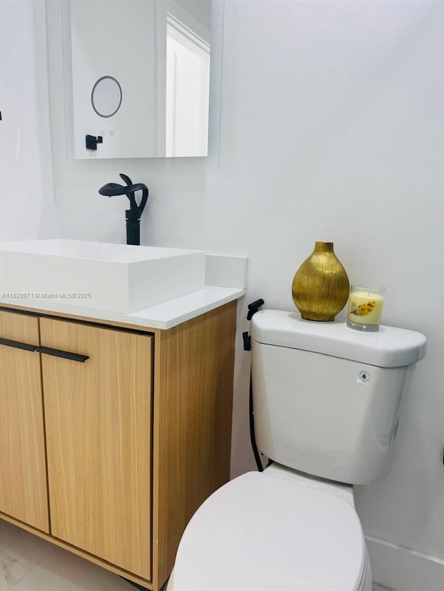 543 E 61st St, Hialeah, FL 33013 - half bath featuring vanity and toilet