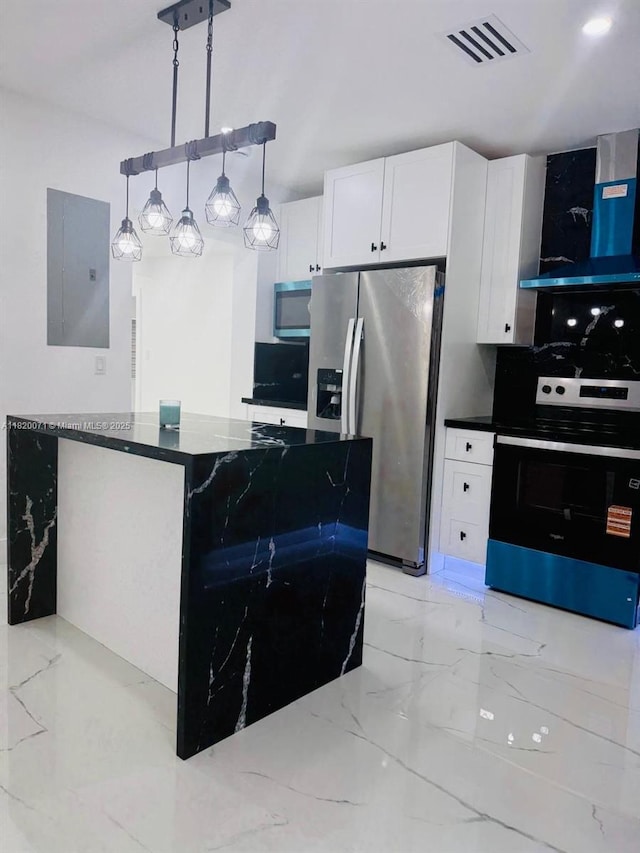 543 E 61st St, Hialeah, FL 33013 - kitchen featuring wall chimney exhaust hood, appliances with stainless steel finishes, light marble finish flooring, electric panel, and white cabinetry