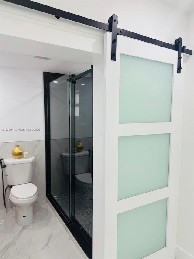 543 E 61st St, Hialeah, FL 33013 - bathroom featuring marble finish floors and a stall shower
