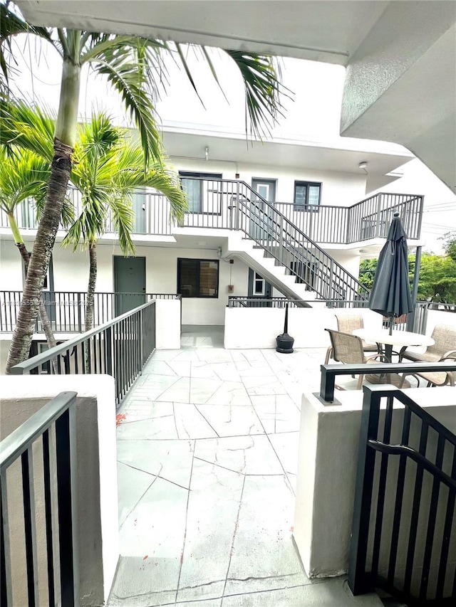 3240 Mary St Unit S207, Miami, FL 33133 - view of home's community featuring stairs and a patio