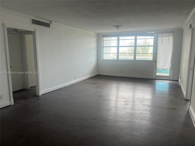 6770 Indian Creek Dr Unit 6D, Miami Beach, FL 33141 - empty room with crown molding and dark wood finished floors