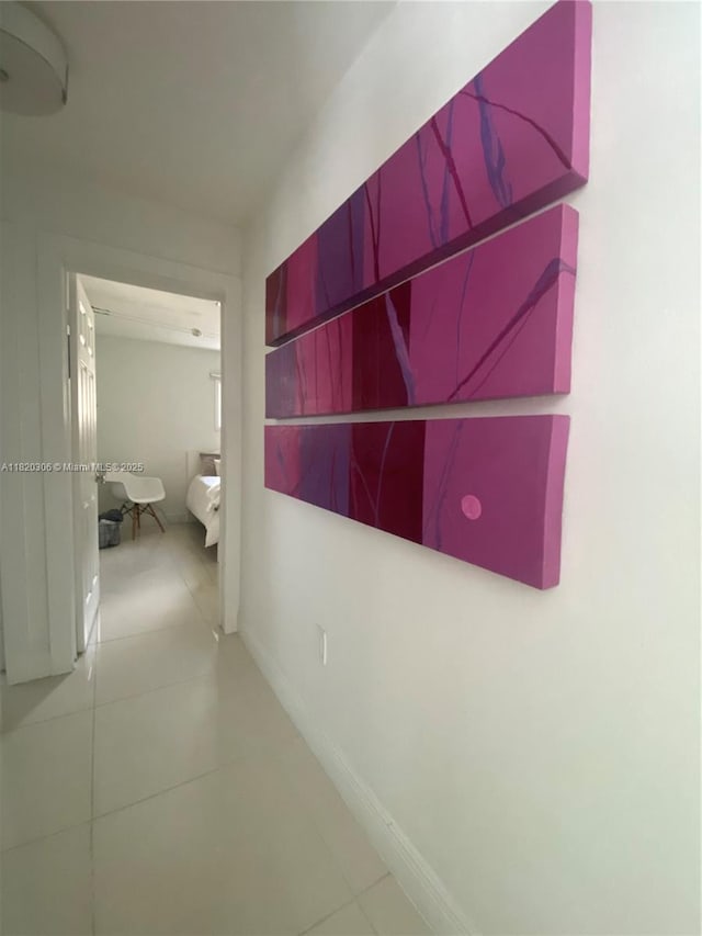 10090 NW 57th St, Doral, FL 33178 - hallway with tile patterned floors