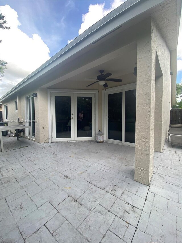10090 NW 57th St, Doral, FL 33178 - view of patio featuring french doors and ceiling fan