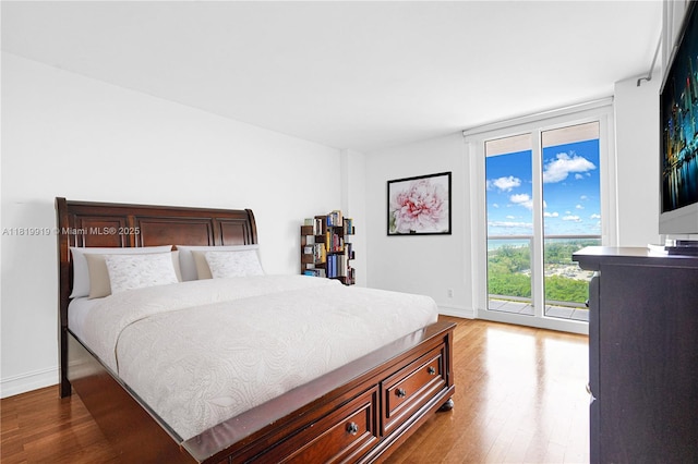 100 Bayview Dr Unit 1223, Sunny Isles Beach, FL 33160 - bedroom with wood finished floors
