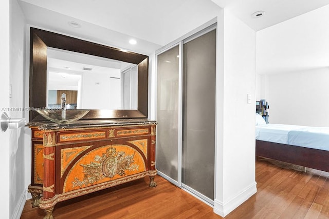 100 Bayview Dr Unit 1223, Sunny Isles Beach, FL 33160 - full bath featuring wood finished floors, vanity, ensuite bath, and recessed lighting