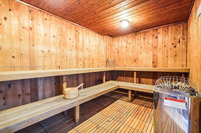 100 Bayview Dr Unit 1223, Sunny Isles Beach, FL 33160 - relaxing sauna featuring wooden ceiling, wood walls, and tile patterned flooring