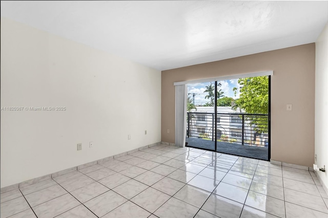 7801 Abbott Ave Unit 307, Miami Beach, FL 33141 - unfurnished room with light tile patterned floors