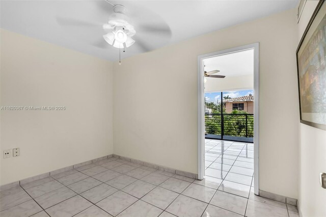 7801 Abbott Ave Unit 307, Miami Beach, FL 33141 - unfurnished room with a ceiling fan and light tile patterned flooring
