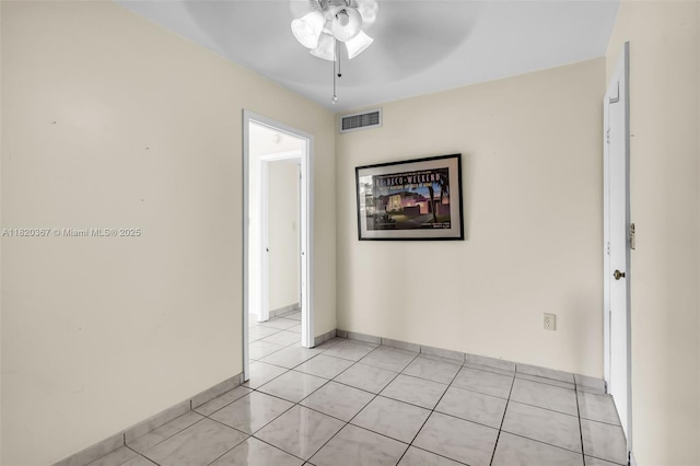 7801 Abbott Ave Unit 307, Miami Beach, FL 33141 - unfurnished room with ceiling fan and light tile patterned flooring