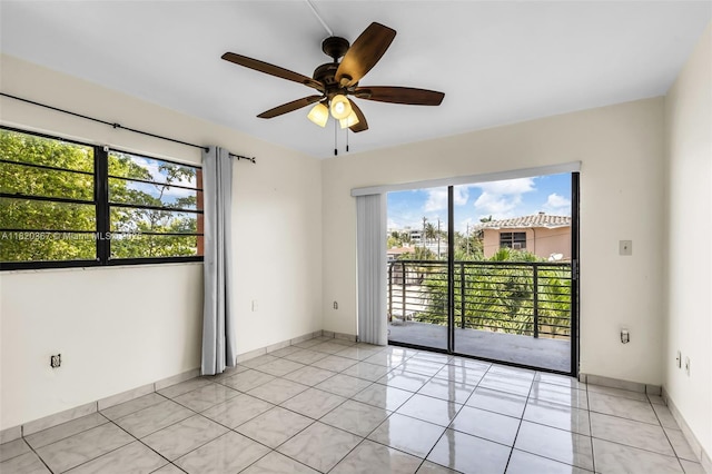 7801 Abbott Ave Unit 307, Miami Beach, FL 33141 - unfurnished room featuring ceiling fan and light tile patterned flooring