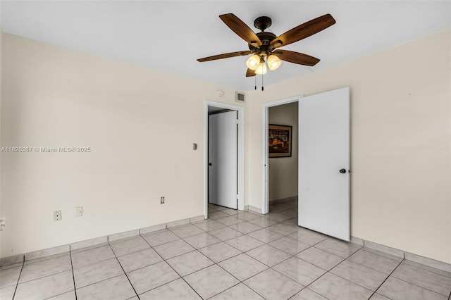 7801 Abbott Ave Unit 307, Miami Beach, FL 33141 - empty room with ceiling fan and light tile patterned floors