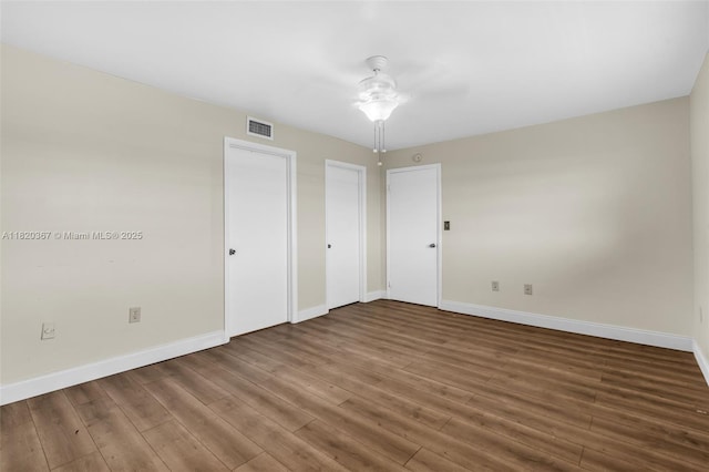 7801 Abbott Ave Unit 307, Miami Beach, FL 33141 - unfurnished bedroom featuring wood finished floors