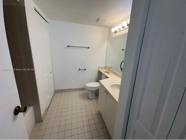 4659 NW 97th Ct Unit 35, Doral, FL 33178 - bathroom featuring vanity and tile patterned flooring
