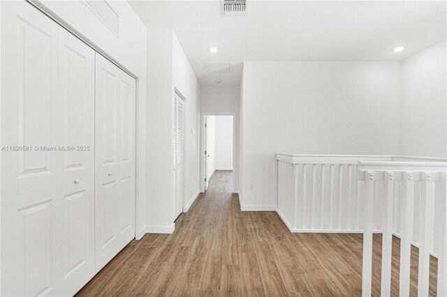 28841 SW 162nd Ave Unit A, Miami, FL 33033 - hallway featuring wood finished floors and recessed lighting