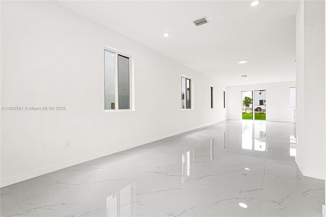 28841 SW 162nd Ave Unit A, Miami, FL 33033 - empty room featuring recessed lighting and marble tiled floors