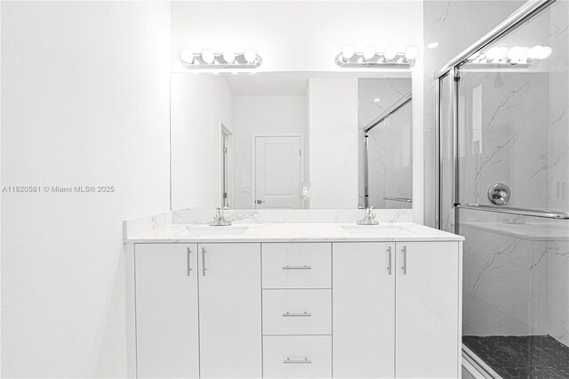 28841 SW 162nd Ave Unit A, Miami, FL 33033 - bathroom featuring double vanity and a marble finish shower