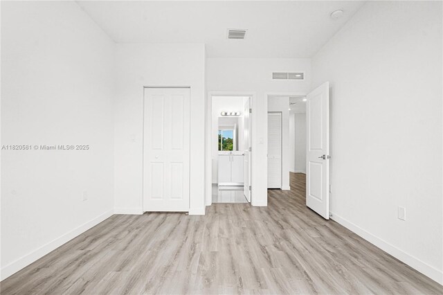 28841 SW 162nd Ave Unit A, Miami, FL 33033 - unfurnished bedroom featuring light wood-style flooring