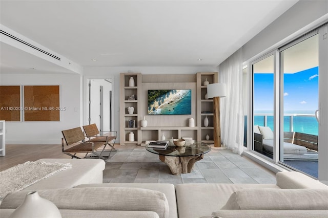 102 24th St Unit Ph-1706, Miami Beach, FL 33139 - living room with built in shelves