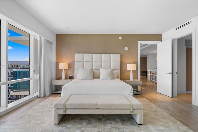 102 24th St Unit Ph-1706, Miami Beach, FL 33139 - bedroom with light wood finished floors