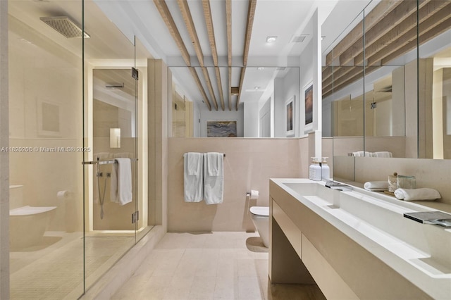 102 24th St Unit Ph-1706, Miami Beach, FL 33139 - bathroom with vanity, a stall shower, and tile patterned floors