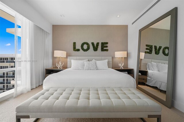 102 24th St Unit Ph-1706, Miami Beach, FL 33139 - bedroom with carpet floors and access to outside