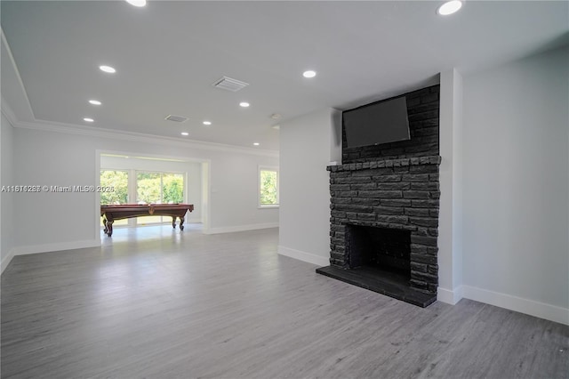8390 SW 64th St, Miami, FL 33143 - living area with crown molding, wood finished floors, recessed lighting, billiards, and a fireplace with raised hearth