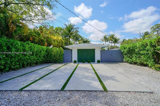 8390 SW 64th St, Miami, FL 33143 - garage featuring a gate