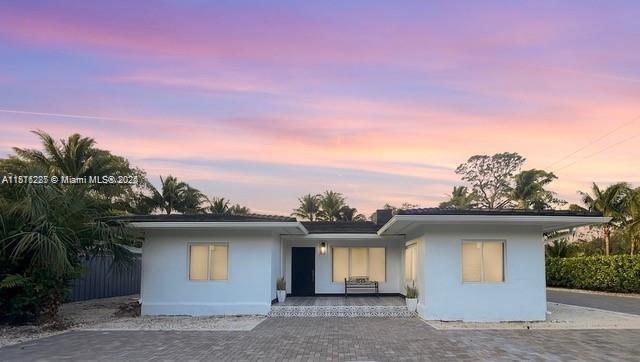 8390 SW 64th St, Miami, FL 33143 - view of front of property featuring stucco siding and covered porch