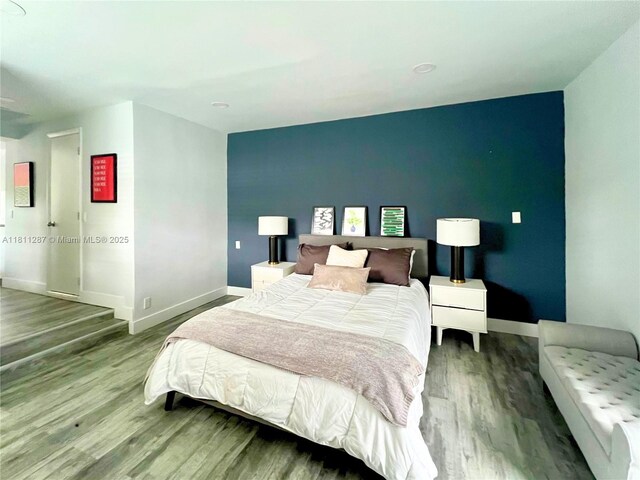 8390 SW 64th St, Miami, FL 33143 - bedroom featuring wood finished floors and baseboards