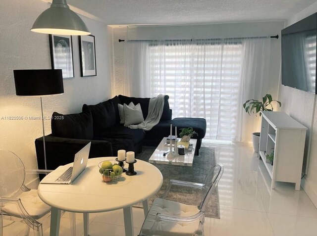 445 SW 11th St Unit 101, Miami, FL 33130 - living room with plenty of natural light
