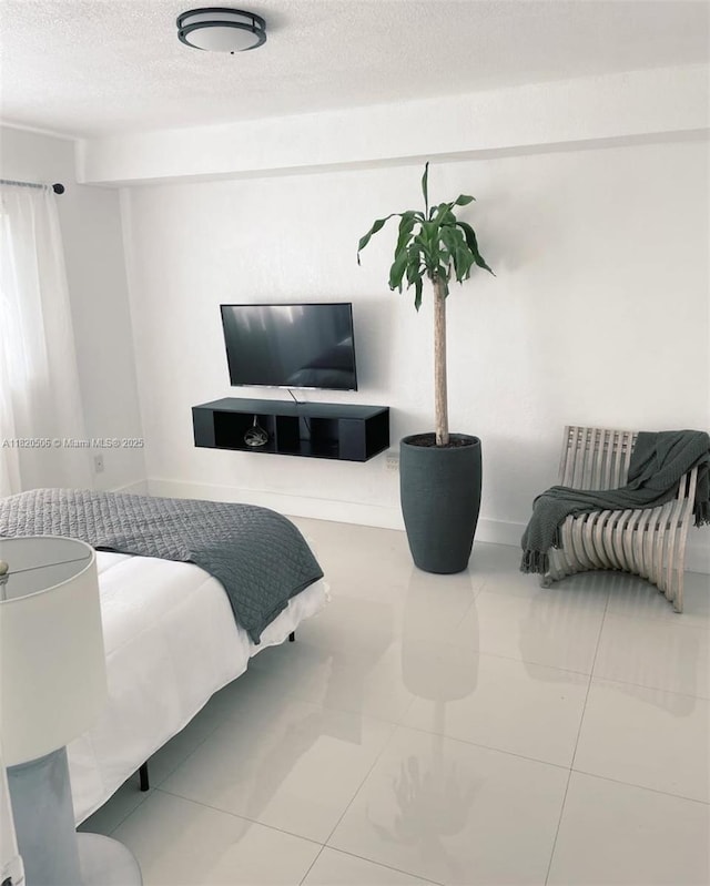 445 SW 11th St Unit 101, Miami, FL 33130 - bedroom with a textured ceiling