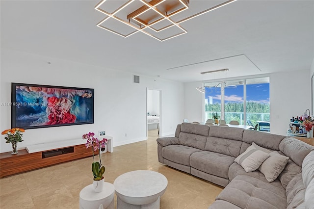 14951 Royal Oaks Ln Unit 803, North Miami, FL 33181 - living area with a chandelier