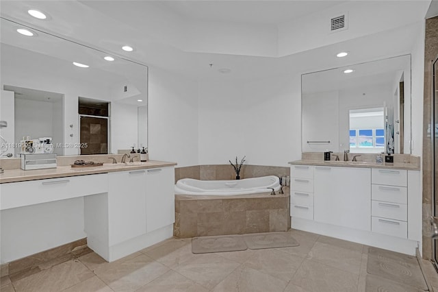 14951 Royal Oaks Ln Unit 803, North Miami, FL 33181 - bathroom with a stall shower, two vanities, a bath, recessed lighting, and tile patterned floors
