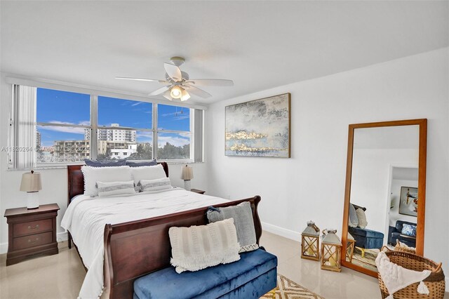 7118 Bonita Dr Unit 405, Miami Beach, FL 33141 - bedroom featuring baseboards and ceiling fan