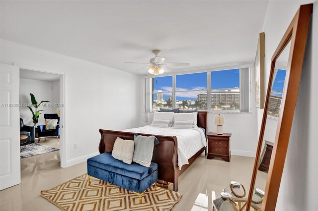 7118 Bonita Dr Unit 405, Miami Beach, FL 33141 - bedroom with baseboards and ceiling fan