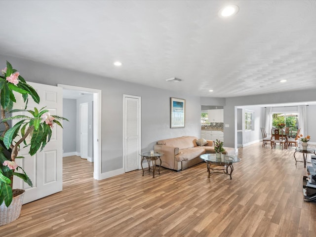 1805 N 23rd Ave, Hollywood, FL 33020 - living area with light wood-style flooring and recessed lighting