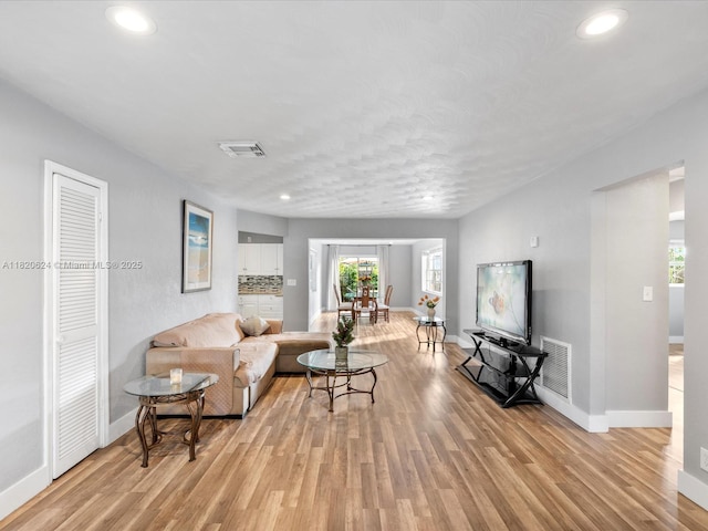 1805 N 23rd Ave, Hollywood, FL 33020 - living room featuring recessed lighting and light wood-style flooring