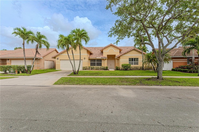 16176 NW 14th Ct, Pembroke Pines, FL 33028 - view of property with concrete driveway, a garage, stucco siding, a front lawn, and a tiled roof