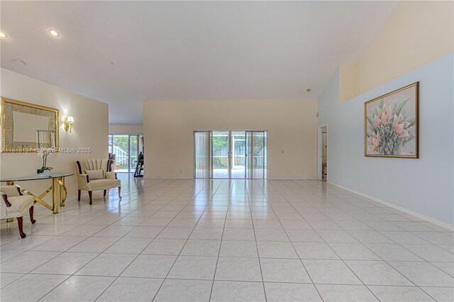 16176 NW 14th Ct, Pembroke Pines, FL 33028 - empty room with light tile patterned floors and recessed lighting